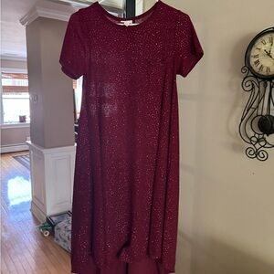 Lularoe. Sized xxs but fits like a small or med. Part of the elegant collection.